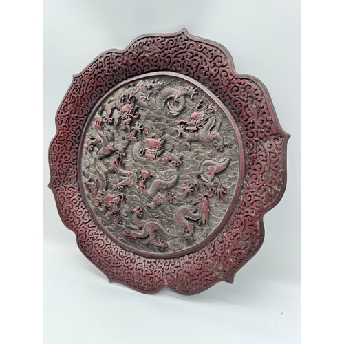 3 - 19th century Chinese Cinnabar plate / charger with Chinese dragon carvings, this plate bares a gilt ... 