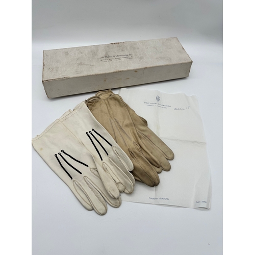 16 - Two pairs of vintage driving gloves in case