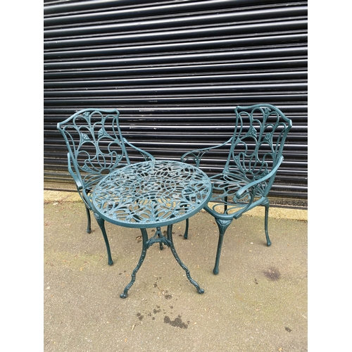 368 - Vintage cast garden table and chairs in green. 

Please see images for dimensions.