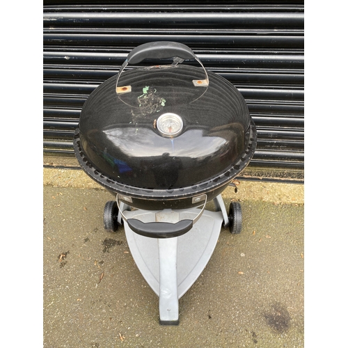 372 - BBQ grill with temperature gauge.