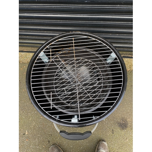 372 - BBQ grill with temperature gauge.