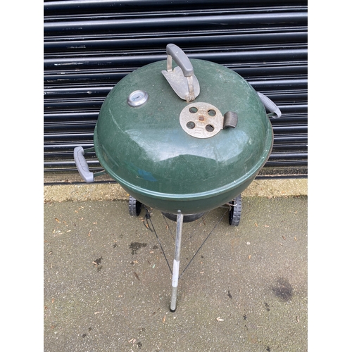 374 - Large weber BBQ grill with temperature gauge and cover.