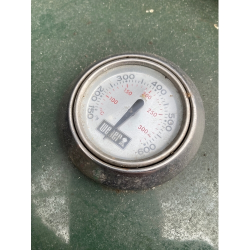 374 - Large weber BBQ grill with temperature gauge and cover.