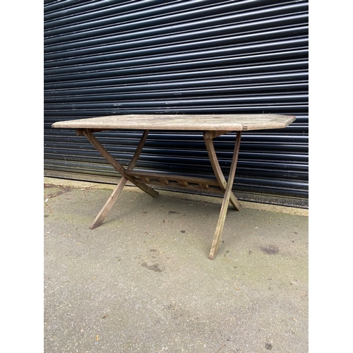 377 - Teak garden table. 

Dimensions - 60