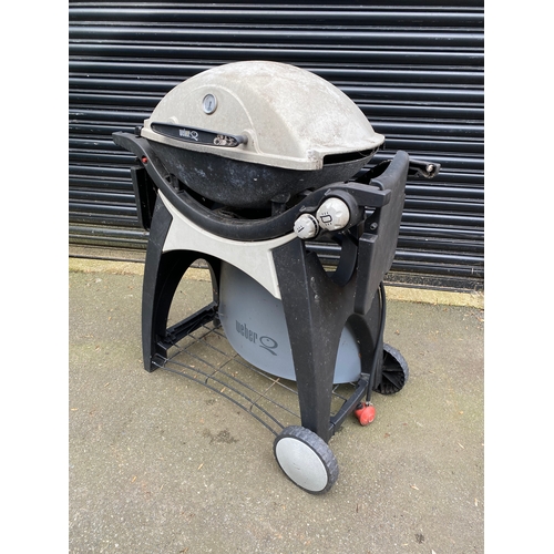 378 - Weber Q gas BBQ grill with side tables.