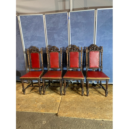 388 - Antique Oak extendable dining table and a set of four Oak carved chairs. 

Dimensions - 18.5