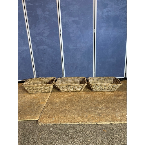 392 - A trio of wicker storage baskets. 

Dimensions - 20