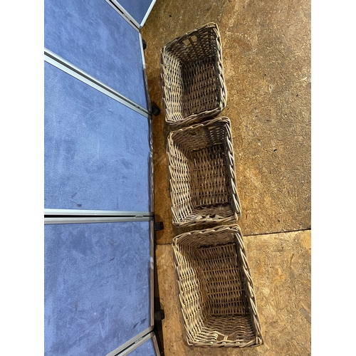 392 - A trio of wicker storage baskets. 

Dimensions - 20