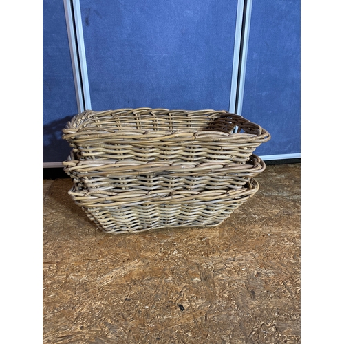 392 - A trio of wicker storage baskets. 

Dimensions - 20