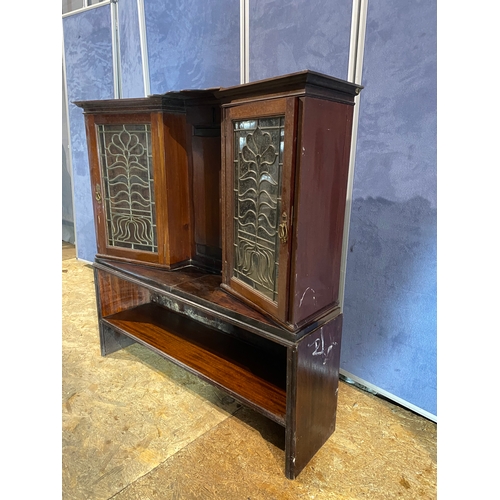 395 - Antique displayed unit married together 

Dimensions - 43.5