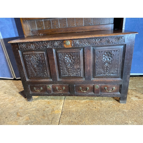 397 - 18th/19th Century carved Oak dresser unit.

Please see images for dimensions.