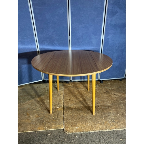 410 - Mid century drop leaf table and three chairs. 

Please see images for all dimensions.