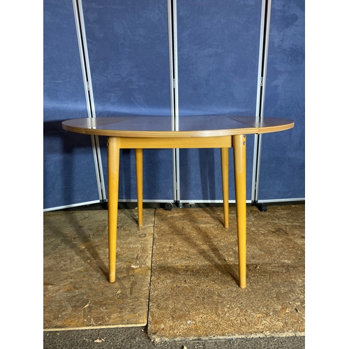 410 - Mid century drop leaf table and three chairs. 

Please see images for all dimensions.