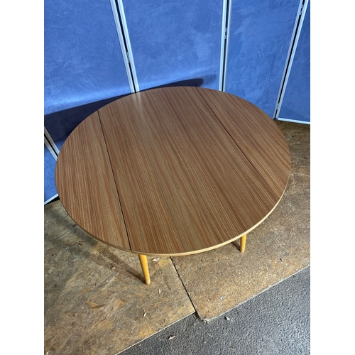 410 - Mid century drop leaf table and three chairs. 

Please see images for all dimensions.