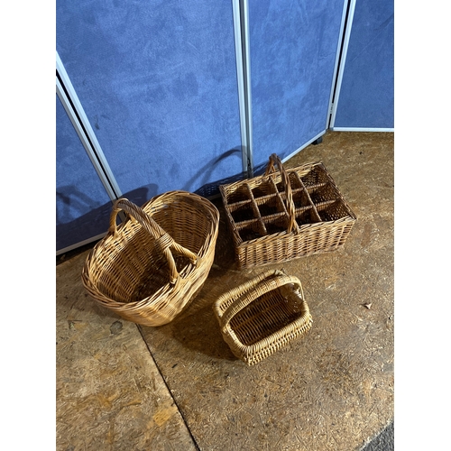 413 - Three wicker baskets. 

Please see images for dimensions of largest for reference.