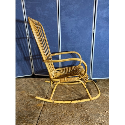 414 - Wicker/Cane rocking chair. 

Dimensions - 22