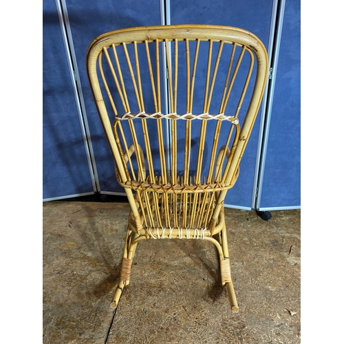 414 - Wicker/Cane rocking chair. 

Dimensions - 22