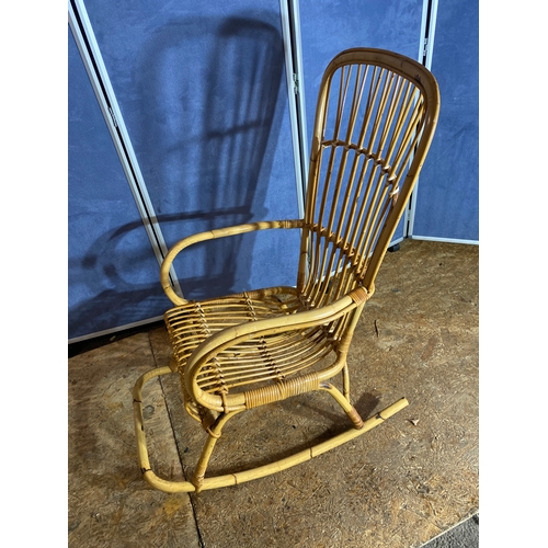 414 - Wicker/Cane rocking chair. 

Dimensions - 22