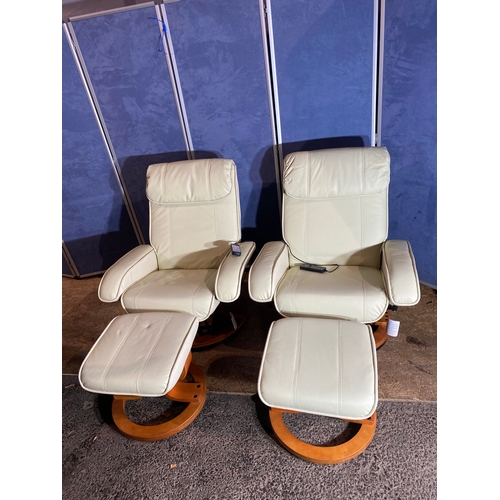 415 - A pair of leather recliner massage chairs and foot stools. 

Dimensions - 32