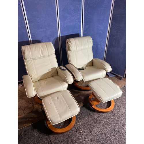 415 - A pair of leather recliner massage chairs and foot stools. 

Dimensions - 32