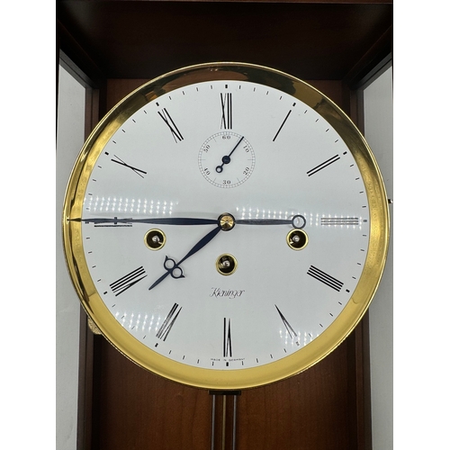 59 - Fine Kieninger Pendulum wall Clock with white enamel face in mahogany and glazed cased - second repe... 