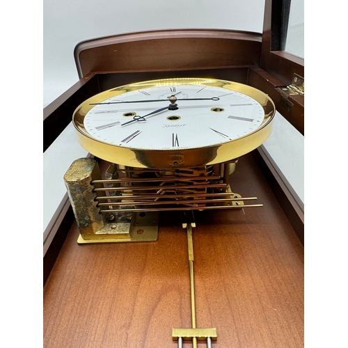 59 - Fine Kieninger Pendulum wall Clock with white enamel face in mahogany and glazed cased - second repe... 