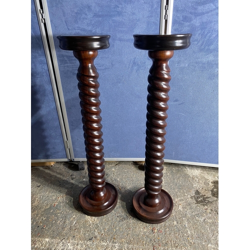 444 - A pair of vintage barley mahogany twist style plant stands