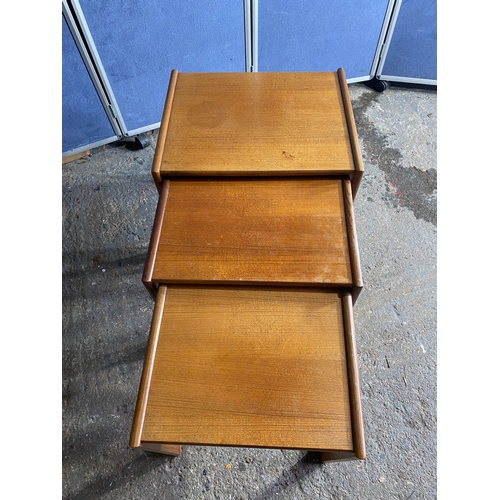 447 - Mid century Teak G Plan nest of three tables. 

Dimensions of largest in images for reference.