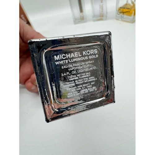 203 - Six bottles of various Michael Kors Fragrances Eau De Parfum / Toilette 100ml