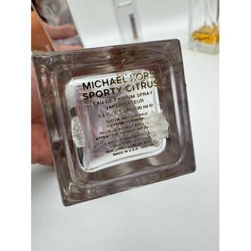 203 - Six bottles of various Michael Kors Fragrances Eau De Parfum / Toilette 100ml