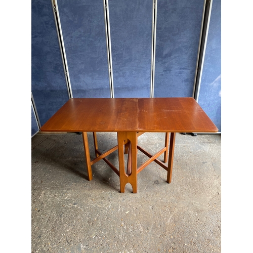 463 - Mid century Teak Gate leg table and four chairs.

Please see images for all dimensions.