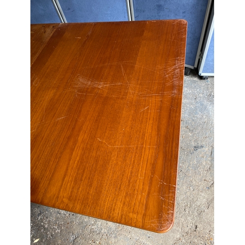 463 - Mid century Teak Gate leg table and four chairs.

Please see images for all dimensions.