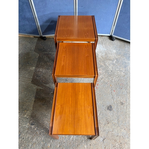 464 - Mid century Teak nest of three tables. 

Dimensions of largest in images for reference.