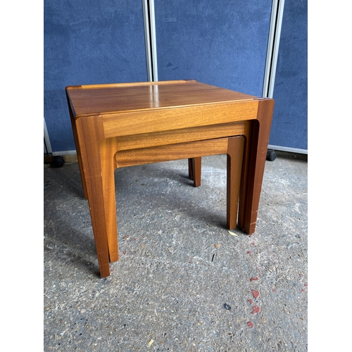 464 - Mid century Teak nest of three tables. 

Dimensions of largest in images for reference.