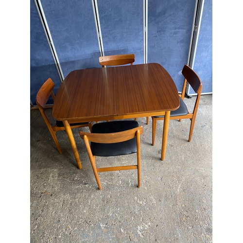 466 - Mid Century Teak extendable dining table and four chairs. 

Please see images for all dimensions.