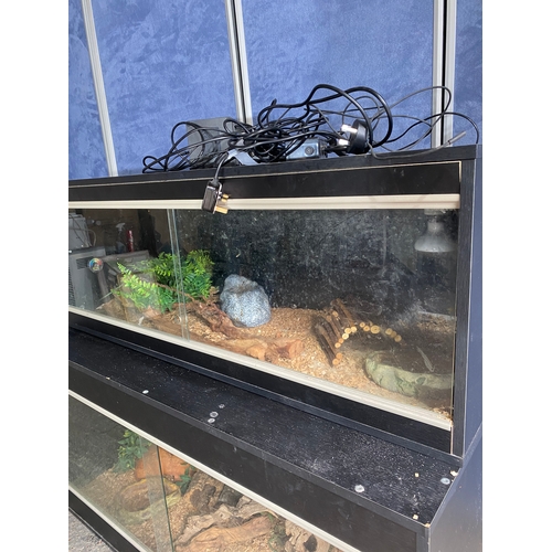 467 - Two reptile vivariums with contents 

See images for dimensions.