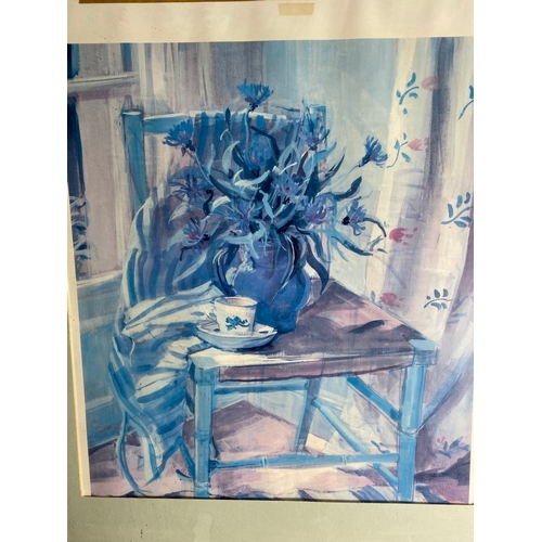 490 - A print of flowers on a chair.