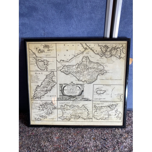 528 - A pair of framed island maps.