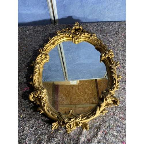 550 - Two small gilt framed mirrors.