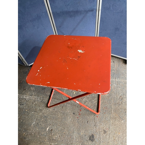 582 - Vintage Orange foldable garden / bistro table and two chairs.