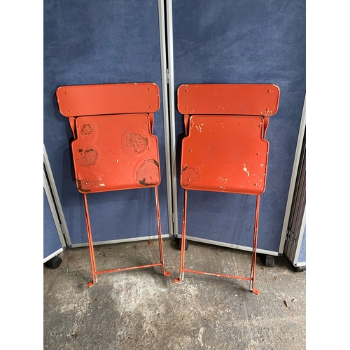 582 - Vintage Orange foldable garden / bistro table and two chairs.