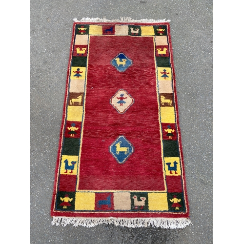 596 - Indian hand woven wool rug / carpet 

Dimensions - 68