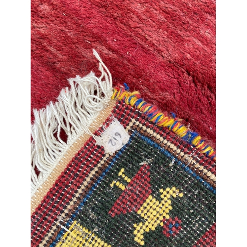 596 - Indian hand woven wool rug / carpet 

Dimensions - 68