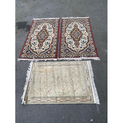 605 - Three small Rugs / Carpets.