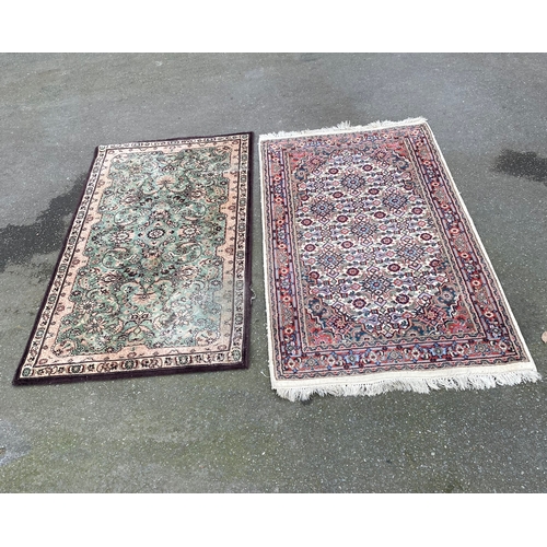 607 - Two Kashmir silk Rugs / Carpets.