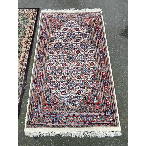 607 - Two Kashmir silk Rugs / Carpets.