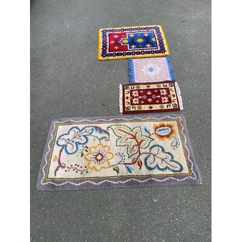 608 - Four small Rugs / Carpets.