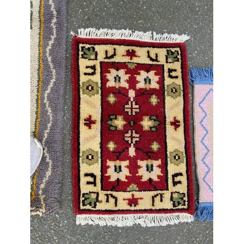 608 - Four small Rugs / Carpets.