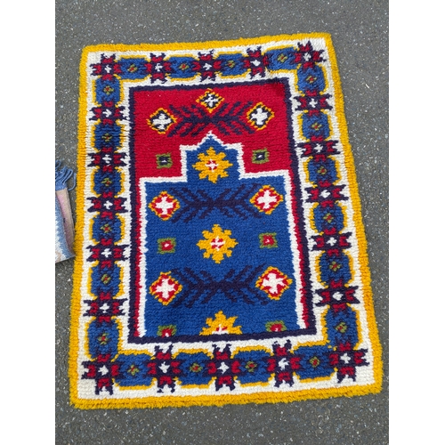 608 - Four small Rugs / Carpets.