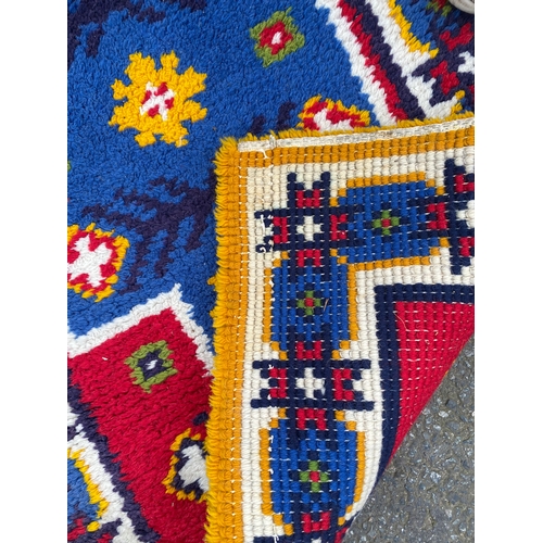 608 - Four small Rugs / Carpets.